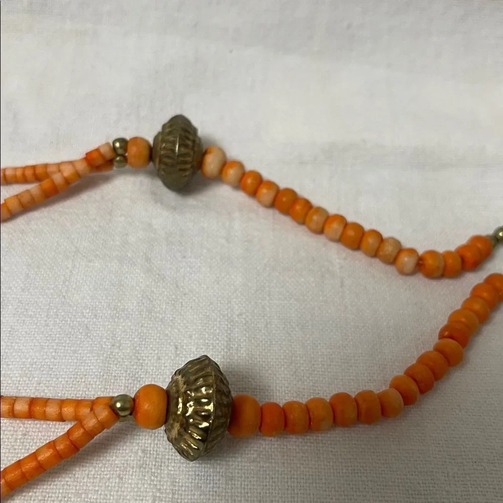 Vintage Orange Beaded Necklace with Gold Accents 14” long.